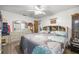 Main bedroom showcasing comfortable furnishings, with neutral decor and a bright, airy ambiance at 6070 Se 39Th Ave, Ocala, FL 34480