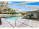 Enjoy the screened pool and patio area, perfect for relaxing and entertaining outdoors at 6070 Se 39Th Ave, Ocala, FL 34480
