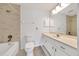 Clean bathroom featuring a shower-tub combo, modern vanity, and neutral tones at 6350 Nw 135Th Ave, Morriston, FL 32668