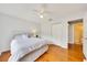 Comfortable bedroom with a ceiling fan and closet for storage at 6350 Nw 135Th Ave, Morriston, FL 32668