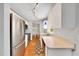 Bright kitchen featuring stainless steel appliances, light countertops, and track lighting at 6350 Nw 135Th Ave, Morriston, FL 32668