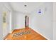 Room featuring lots of natural light, a door to the outside, and hardwood flooring at 6350 Nw 135Th Ave, Morriston, FL 32668