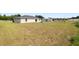 Sprawling backyard of a home with lots of potential for outdoor activities and gardening at 6561 Sw 129Th Loop, Ocala, FL 34473