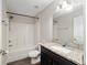 Full bathroom with shower-tub combo, stylish vanity, and modern fixtures create a comfortable space at 6561 Sw 129Th Loop, Ocala, FL 34473