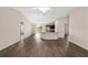 Open concept living space featuring modern flooring, and stainless steel appliances at 6561 Sw 129Th Loop, Ocala, FL 34473