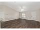 Inviting living room featuring modern flooring, white trim, and ample natural light at 6561 Sw 129Th Loop, Ocala, FL 34473