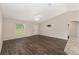 Bright living room with modern floors, neutral walls, and large window at 6561 Sw 129Th Loop, Ocala, FL 34473