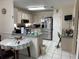 Functional kitchen with stainless steel appliances, and ample storage, and a breakfast bar at 7251 Sw 115Th Pl, Ocala, FL 34476