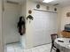Pantry with a large door, and shelving providing storage for a variety of kitchen supplies at 7251 Sw 115Th Pl, Ocala, FL 34476