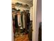 Spacious walk-in closet with ample hanging and storage space, providing easy organization for clothing and accessories at 7251 Sw 115Th Pl, Ocala, FL 34476