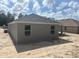 The backyard of a single-story home, showcasing the outdoor space at 7637 Sw 180Th Cir, Dunnellon, FL 34432