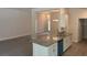 Spacious kitchen with a large island, granite countertops, and stainless steel appliances at 7637 Sw 180Th Cir, Dunnellon, FL 34432