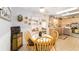 Open concept: a delightful breakfast nook leading into the fully equipped kitchen at 8420 Sw 93 Ln # E, Ocala, FL 34476
