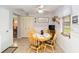 Charming breakfast nook featuring a ceiling fan and a view to the outside at 8420 Sw 93 Ln # E, Ocala, FL 34476