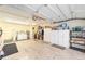 Spacious garage with a washer, dryer, and plenty of storage cabinets at 8420 Sw 93 Ln # E, Ocala, FL 34476