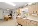 Cozy kitchen with breakfast nook and convenient access to the adjacent room at 8420 Sw 93 Ln # E, Ocala, FL 34476