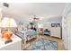 Comfortable main bedroom with tile floors and plenty of natural light at 8420 Sw 93 Ln # E, Ocala, FL 34476