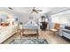 Serene main bedroom boasting comfortable bedding and ample space for relaxation at 8420 Sw 93 Ln # E, Ocala, FL 34476