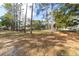 Scenic view of the neighborhood showing tall trees and well-maintained lawns creating a peaceful environment at 8420 Sw 93 Ln # E, Ocala, FL 34476