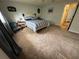 Inviting bedroom with a soft carpet and a window at 8801 Sw 92Nd St # B, Ocala, FL 34481