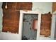 Interior shot of partially gutted home with historic details including vintage doors and beadboard at 1050 E Highway 329, Citra, FL 32113