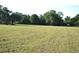 Prime land featuring an expansive grassy field, ideal for residential development or custom home at 1050 E Highway 329, Citra, FL 32113