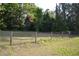 Spacious grassy lot with mature trees perfect for building your dream home at 1050 E Highway 329, Citra, FL 32113
