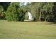 Picture of a grassy lot featuring mature trees needing to be cleared at 1050 E Highway 329, Citra, FL 32113