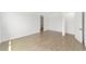 Spacious bedroom with wood-style tile floors, neutral walls and ample natural light at 10562 Sw 96Th Lane Rd, Ocala, FL 34481