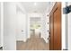 Inviting home entryway with wood-look tile flooring and neutral wall paint at 10562 Sw 96Th Lane Rd, Ocala, FL 34481