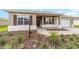 Charming single-Gathering home with a well-maintained lawn and inviting front porch at 10562 Sw 96Th Lane Rd, Ocala, FL 34481