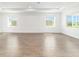 Bright living room featuring tile floors, recessed lighting, and large windows with a view at 10562 Sw 96Th Lane Rd, Ocala, FL 34481