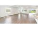 Spacious living room with ceramic tile flooring, recessed lighting, and abundant natural light at 10562 Sw 96Th Lane Rd, Ocala, FL 34481