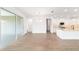 Spacious living room next to kitchen with sliding glass door to the lanai at 10562 Sw 96Th Lane Rd, Ocala, FL 34481