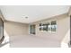A covered outdoor patio provides a great space for relaxation and recreation at 10562 Sw 96Th Lane Rd, Ocala, FL 34481