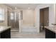 Elegant bathroom featuring a soaking tub, walk-in shower, and modern fixtures at 10910 Sw 41St Ave, Ocala, FL 34476