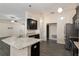 Stylish kitchen with stainless appliances and granite countertops at 10910 Sw 41St Ave, Ocala, FL 34476