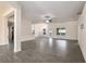 Spacious living room with an open layout, modern flooring, and neutral paint at 10910 Sw 41St Ave, Ocala, FL 34476