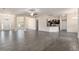Open floor plan showcasing the seamless flow between living and kitchen areas at 10910 Sw 41St Ave, Ocala, FL 34476