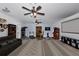 Basement area equipped with exercise equipment and entertainment area at 12677 Se 53Rd Terrace Rd, Belleview, FL 34420