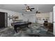 Finished basement space features a pool table, kitchen area, and poker table at 12677 Se 53Rd Terrace Rd, Belleview, FL 34420