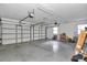 Spacious three-car garage with ample room for storage and multiple vehicles at 12677 Se 53Rd Terrace Rd, Belleview, FL 34420