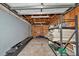 Unfinished garage featuring shelving, ideal for storing materials at 12677 Se 53Rd Terrace Rd, Belleview, FL 34420