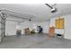 Large garage with two windows offering ample natural light and space for multiple cars at 12677 Se 53Rd Terrace Rd, Belleview, FL 34420