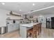 Spacious kitchen with center island, stainless steel appliances, and modern cabinetry, perfect for cooking and entertaining at 12677 Se 53Rd Terrace Rd, Belleview, FL 34420