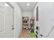 Walk-in pantry with plenty of storage space for food and household items at 12677 Se 53Rd Terrace Rd, Belleview, FL 34420