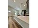 Bright kitchen featuring an island with countertop seating and modern appliances, perfect for Gathering gatherings at 13319 Sw 106Th Pl, Dunnellon, FL 34432