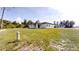 A spacious backyard features a well-maintained lawn, offering a great space for outdoor entertainment at 15215 Sw 43Rd Ct, Ocala, FL 34473