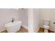 Bathroom featuring a freestanding tub, tiled shower, and modern fixtures for relaxation and convenience at 15215 Sw 43Rd Ct, Ocala, FL 34473