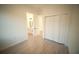 Bedroom featuring a closet and a view into an ensuite bathroom at 15215 Sw 43Rd Ct, Ocala, FL 34473